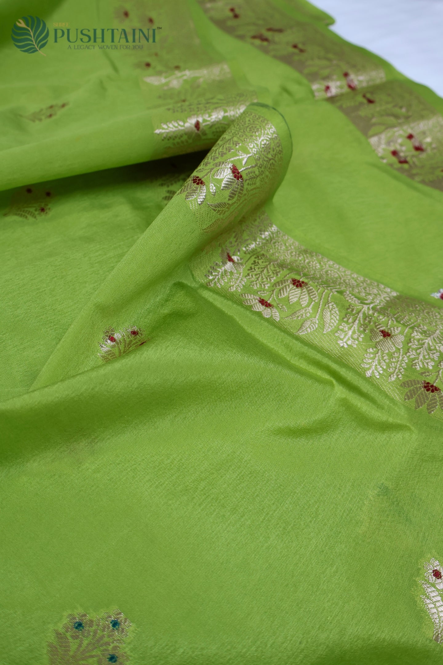 Parrot Green Semi Viscos Georgette Saree with Meenakari Touch